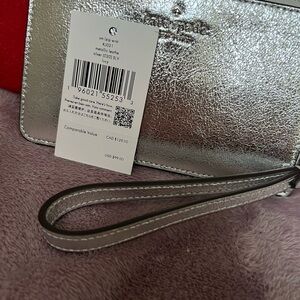 Kate Spade silver metallic wristlet